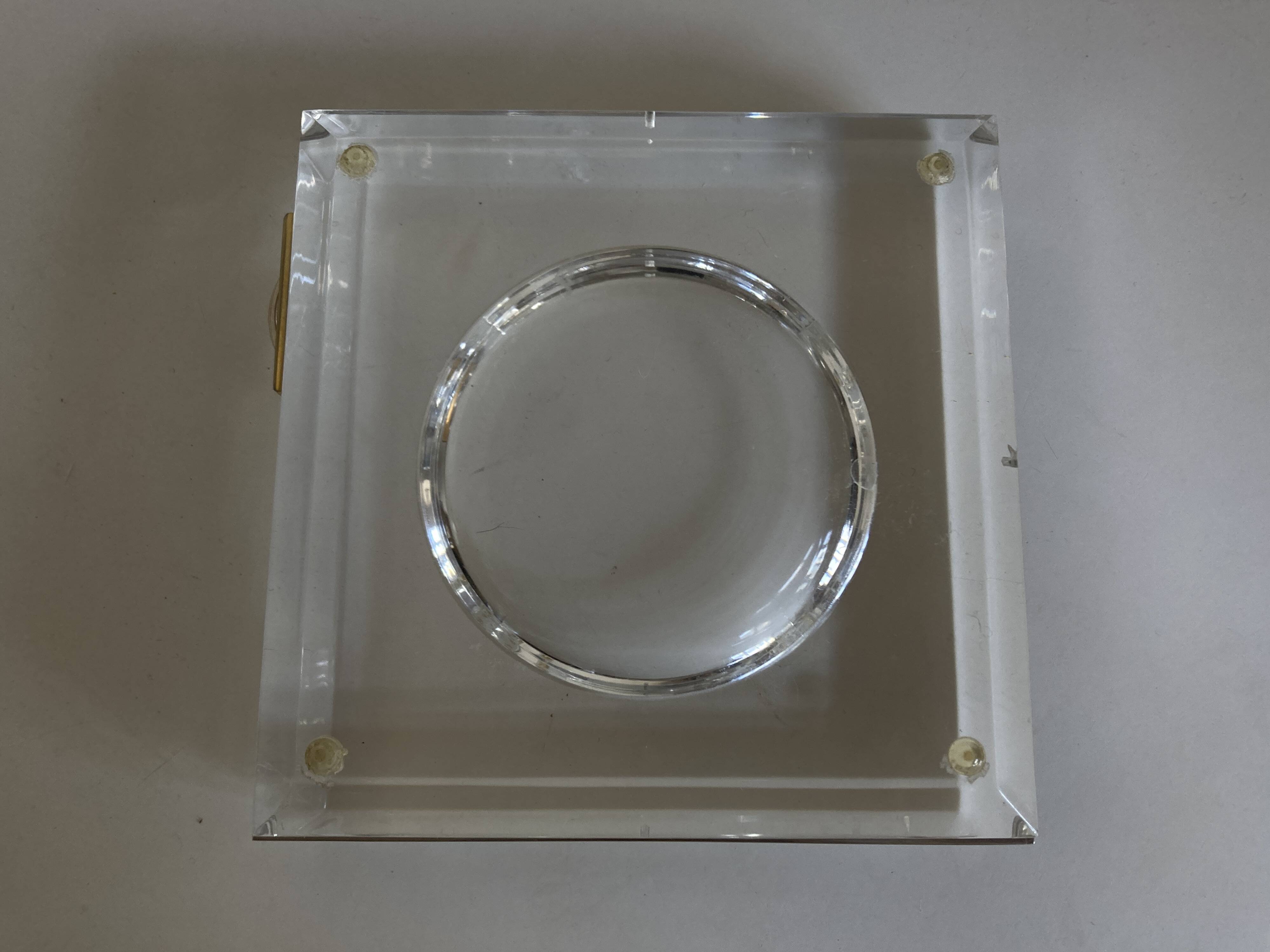 Plexiglas pocket emptier with brass and nickel silver surround, 1975, in the style of Pergay