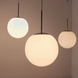 One of Twenty Chrome and Opal Glass Bubble Pendants by Peill & Putzler, designed by Wilhelm Wagenfeld