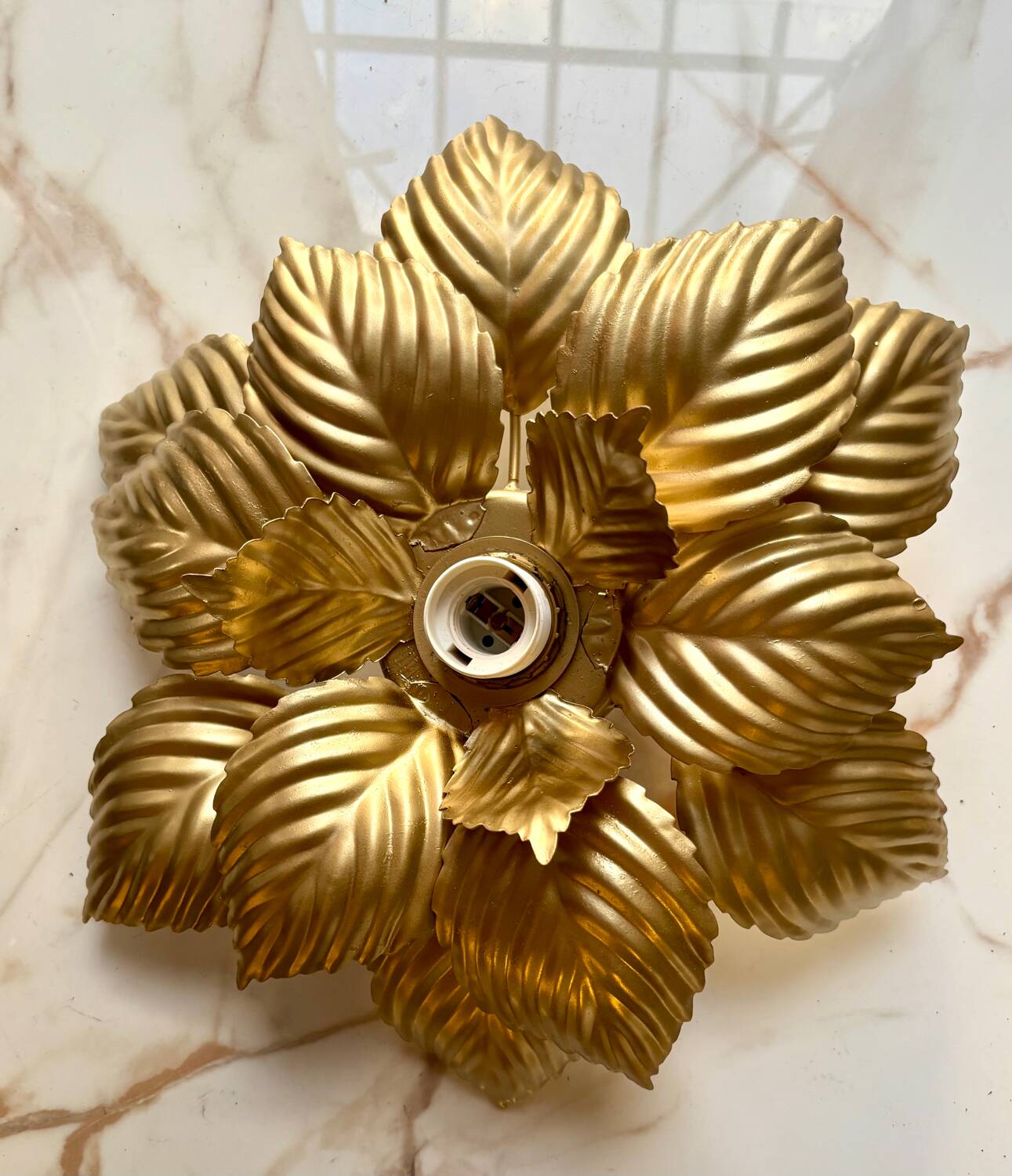 Paire d’appliques fleur dorées