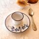 Glazed ceramic shell with painted floral decoration