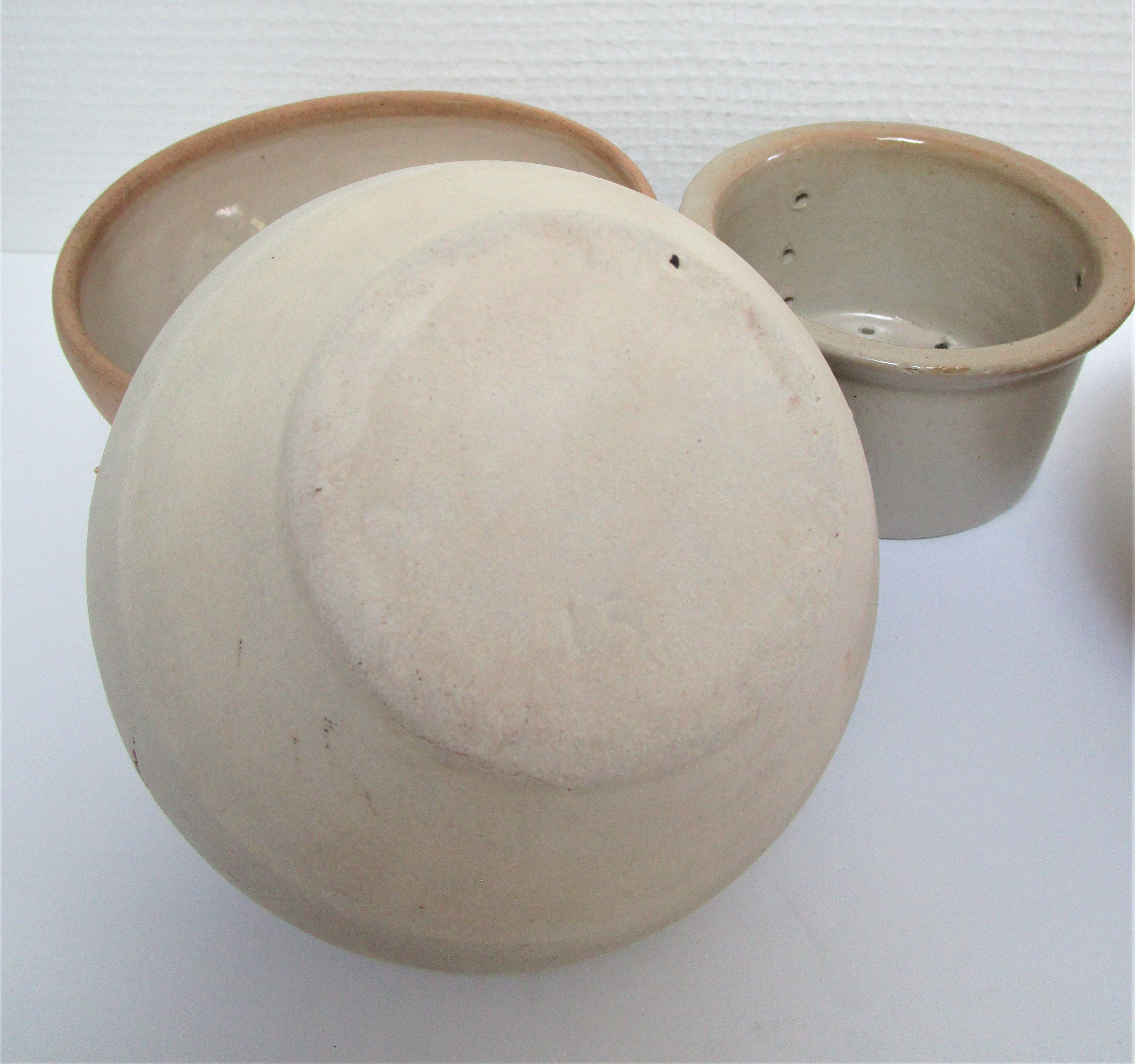 Three XL bowls and old stoneware dish