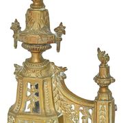 Pair of gilded brass fire dogs decorated with fire pots in the Louis XVI style.