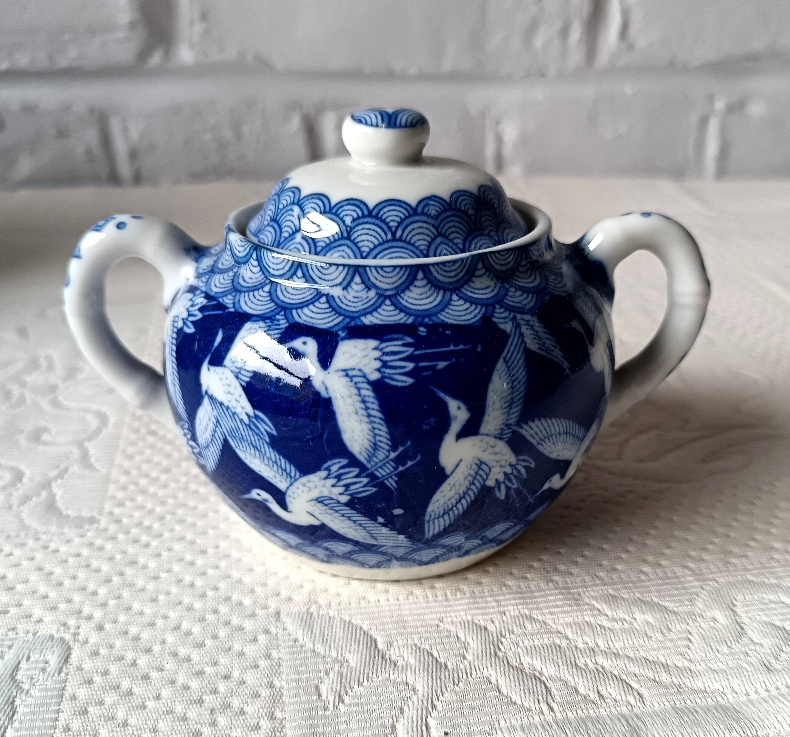Japanese tea set in fine porcelain with crane motif