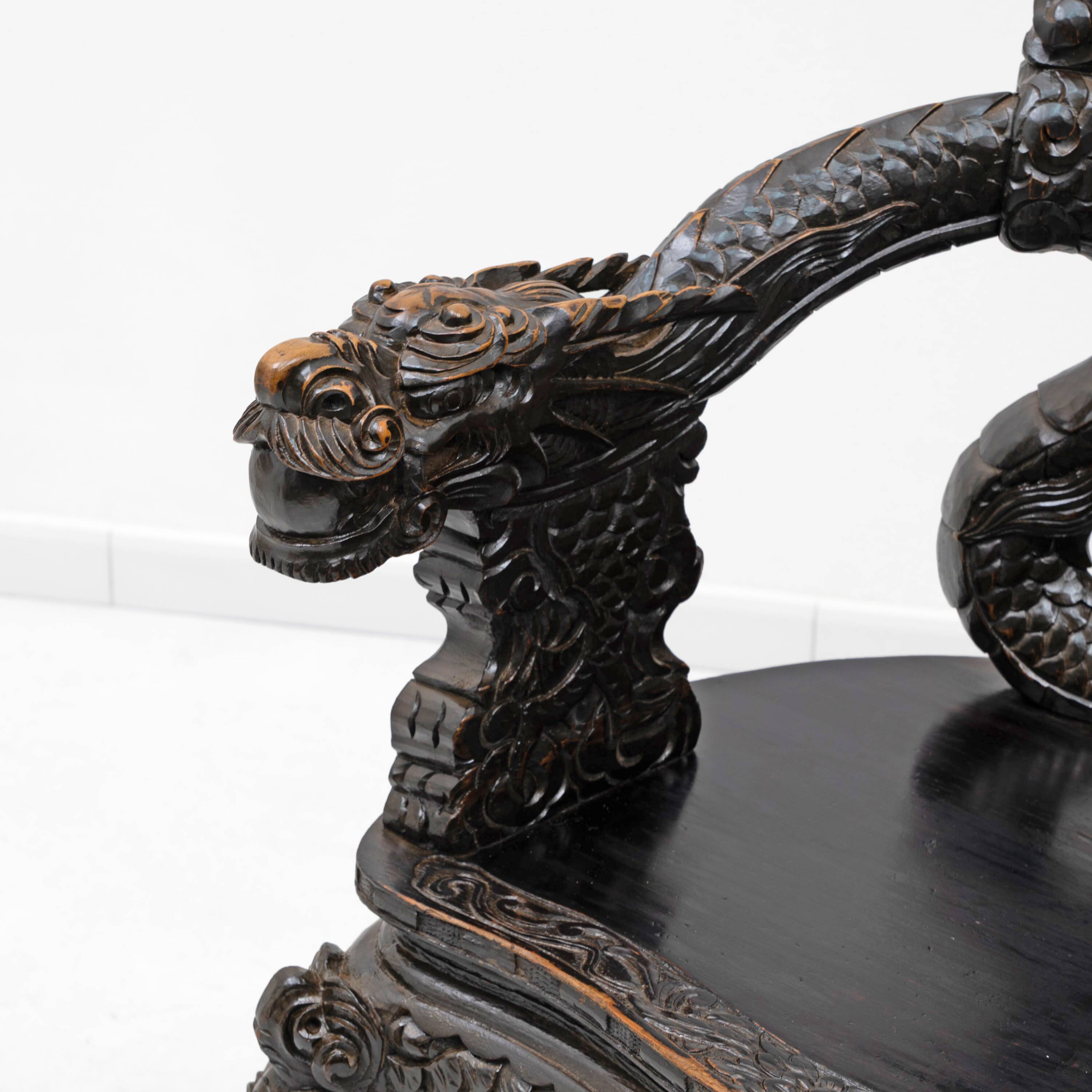 Pair of Chinese Qing Dynasty Carved Dragon Armchairs,Ebonized Hardwood,19th