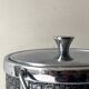 Large modernist chrome metal ice bucket with textured decoration, 1970s design.