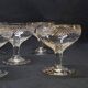 12 old champagne glasses in blown and engraved glass