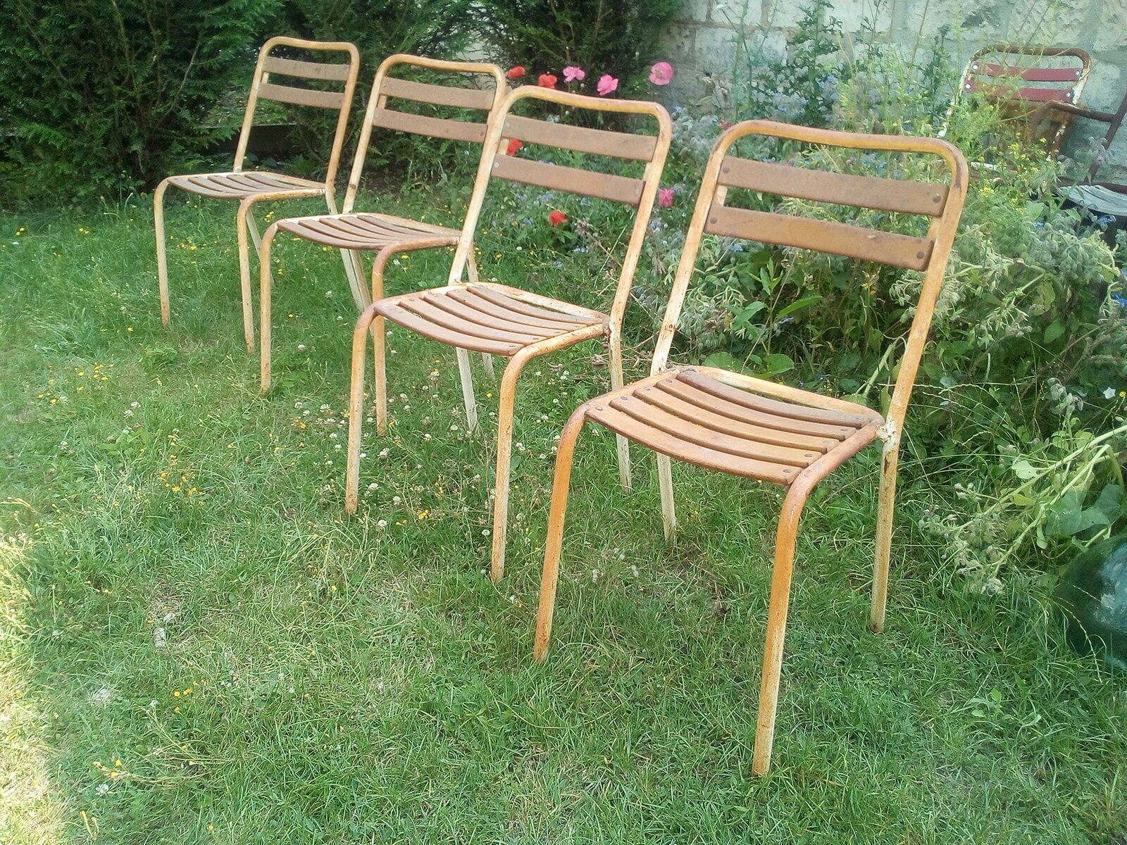 Serie de 4 chaises en tôle
