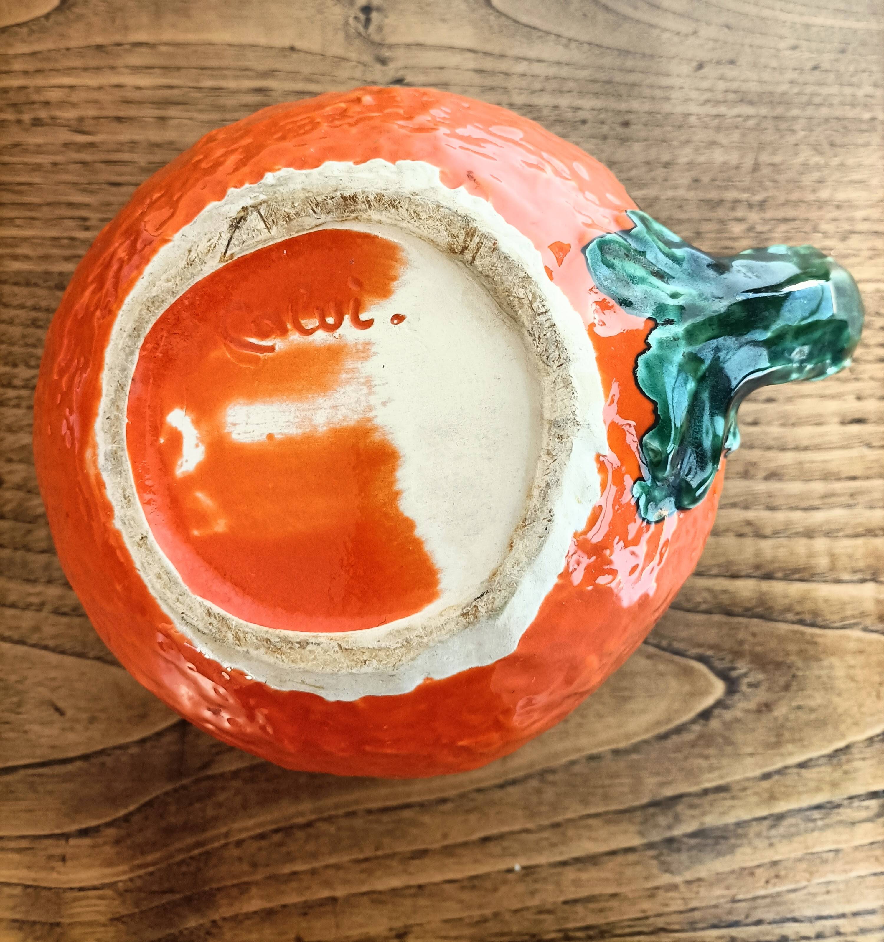 Orange pitcher in Corsican slip