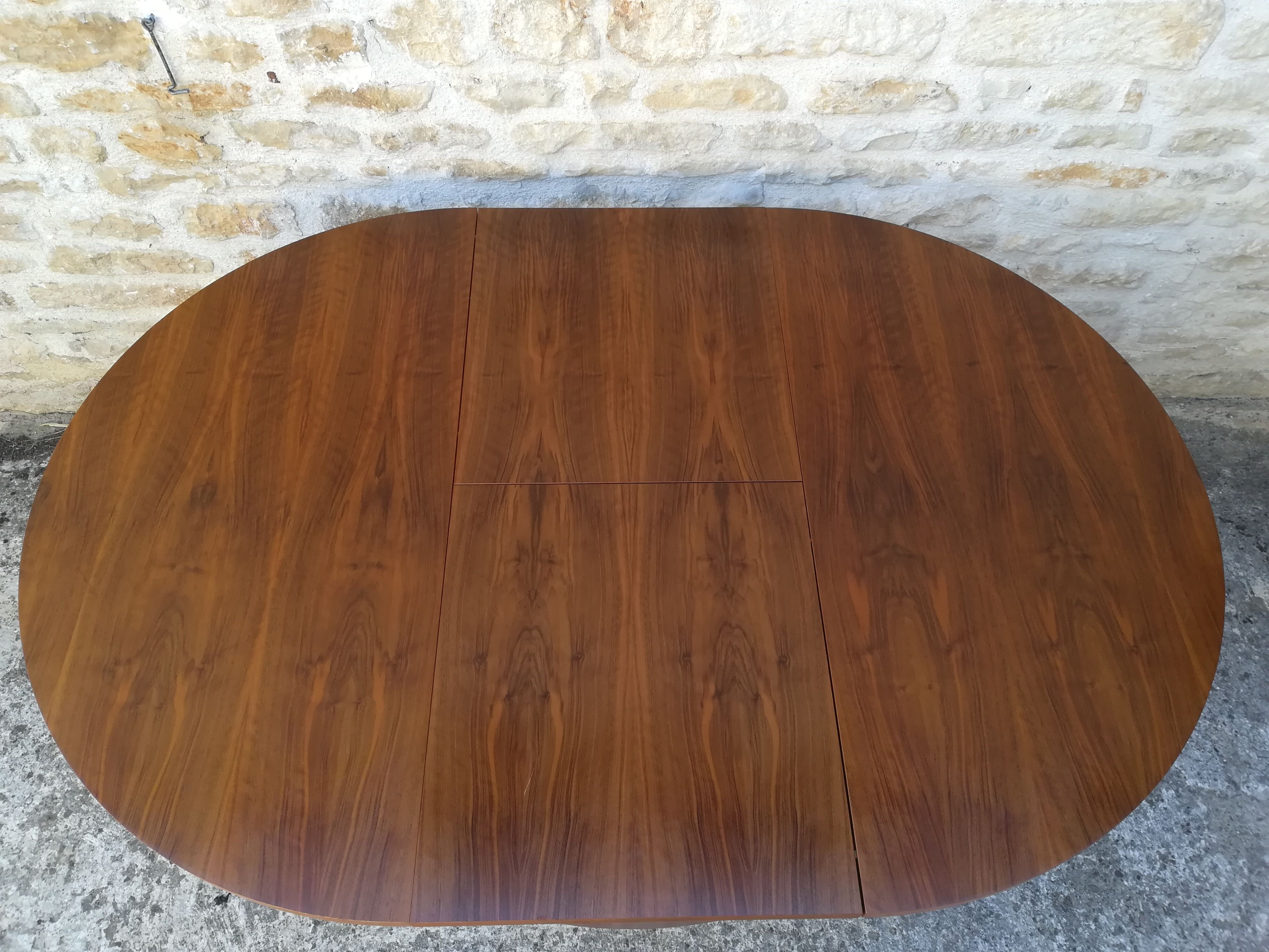 Round table with an extension