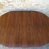 Round table with an extension