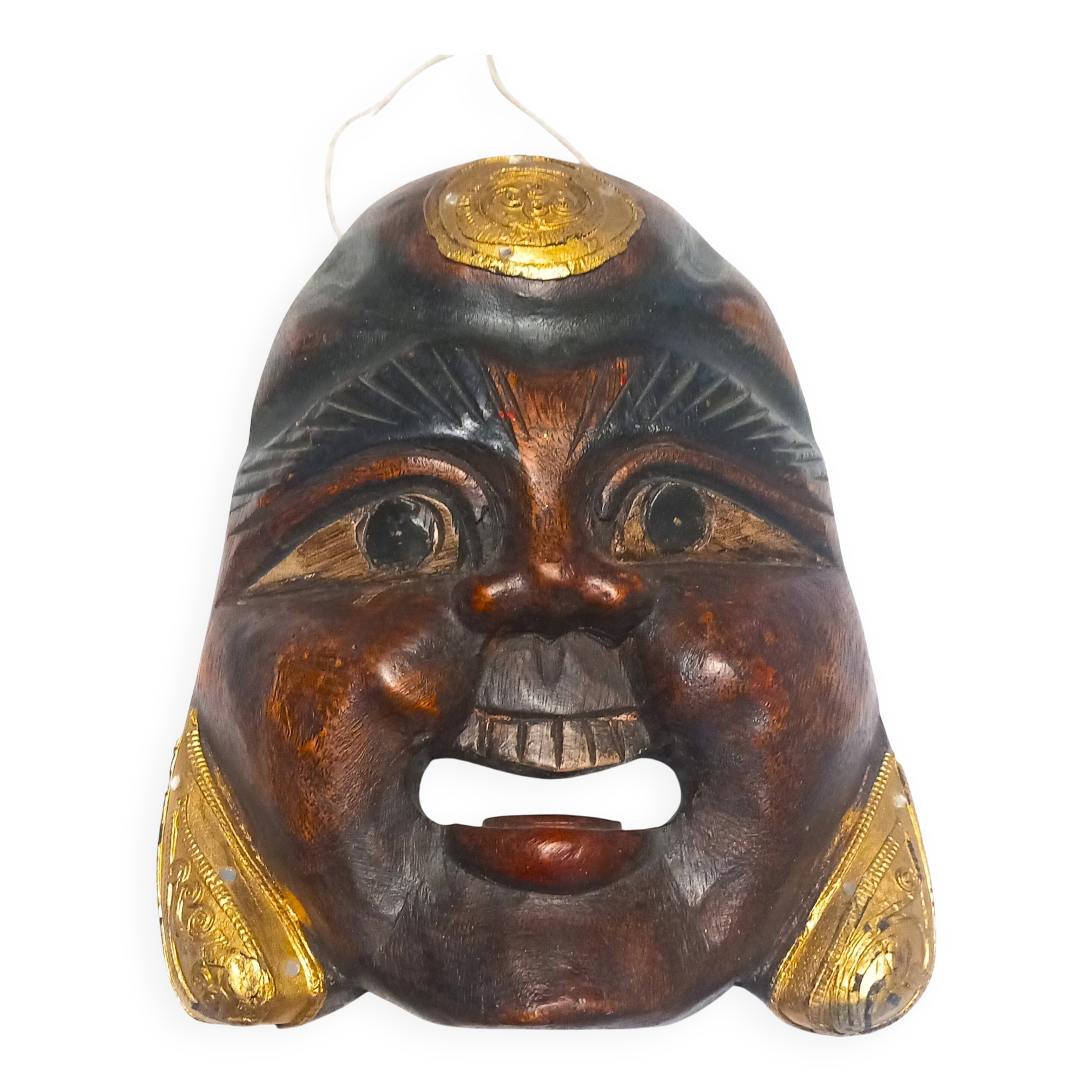 Ancien masque en bois de Boudha