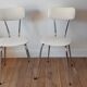 Duo of chairs in skaï, 60-70s