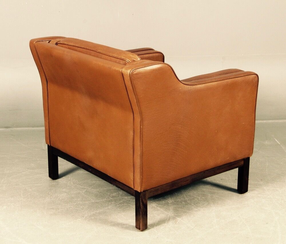 Armchair design Scandinavian brown leather.