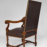 Louis XIII office armchair in leather and walnut carved around 1860