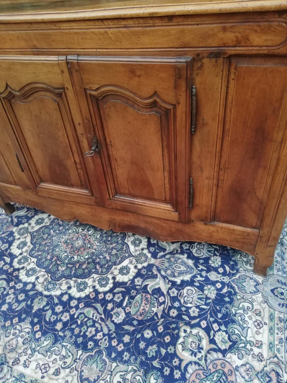 A Louis XV walnut sideboard