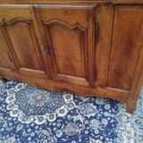 A Louis XV walnut sideboard