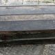 Old bulging wooden travel trunk