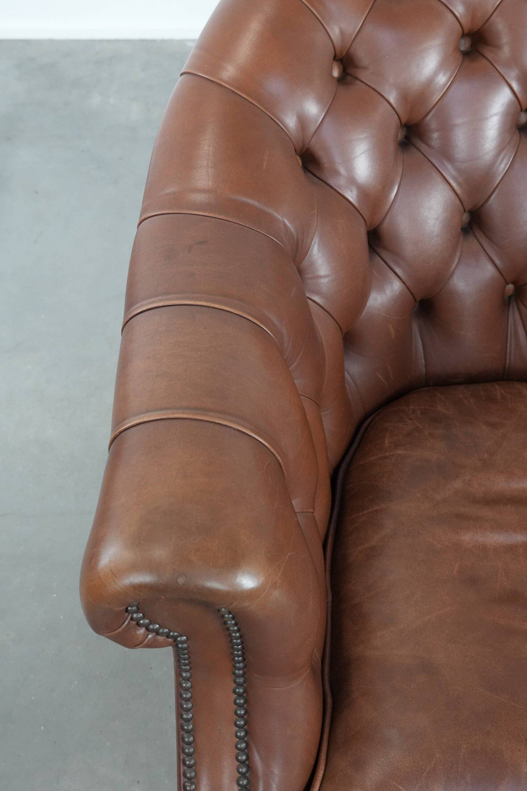 Chesterfield club armchair made of cowhide leather in English style