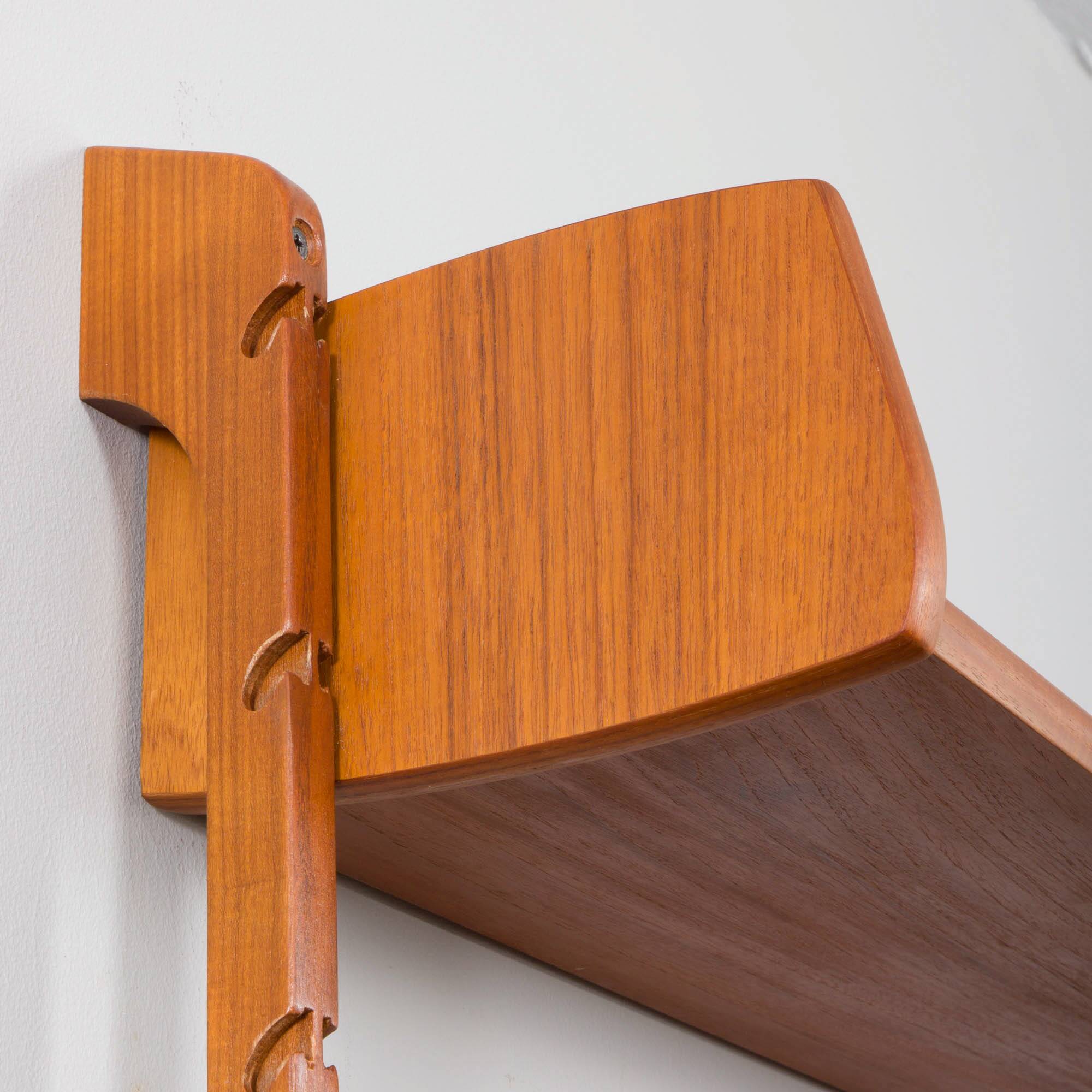 Scandinavian modern wall shelving system Ergo in teak by J. Texmon, Norway, 1960s