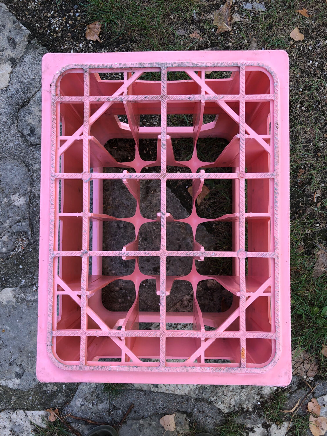 Evian bottle holder in pink plastic