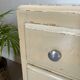 Vintage patinated wood chest of drawers