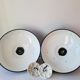 Duo of white and black enameled sheet metal pendants