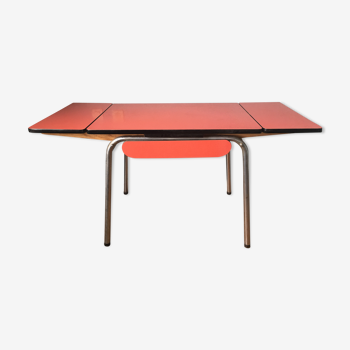 Large table in red formica with extensions + red drawer