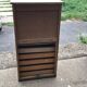 Brown lacquered wooden industrial cabinet with sliding curtain, 1950s, Czech Republic.