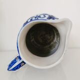 Blue and white pitcher