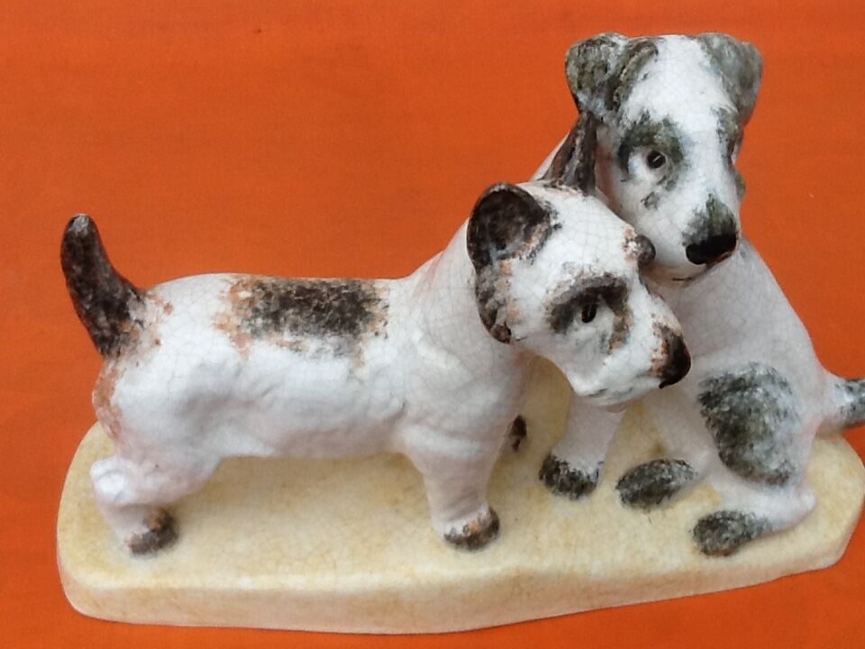 Zoomorphic sculpture cracked ceramic fox terrier dogs