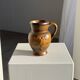 Speckled stoneware jug with grape pattern H17