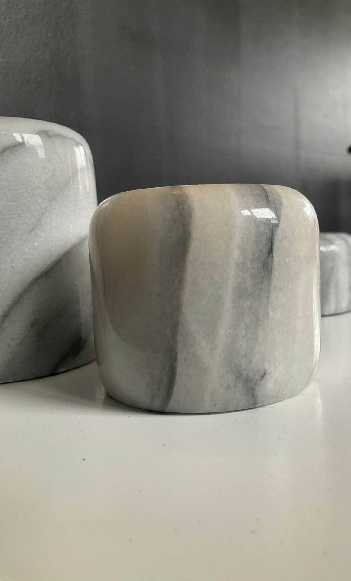 Set of 5 nesting candle holders in white marble.