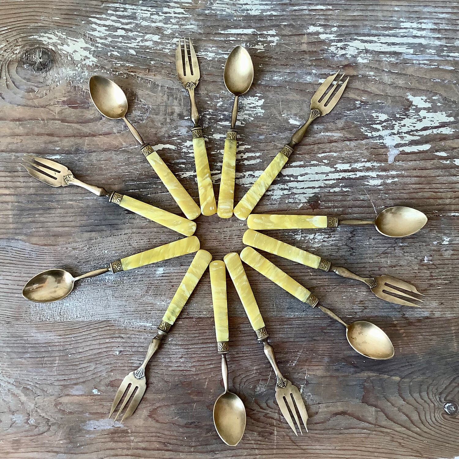 Brass and bakelite dessert cutlery