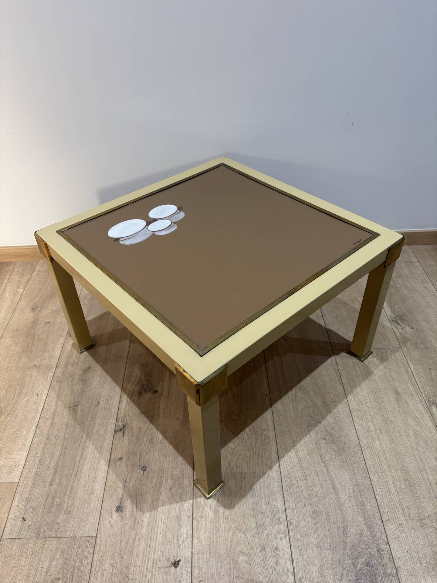 Metal and brass coffee table in ceramic by Nisco.
