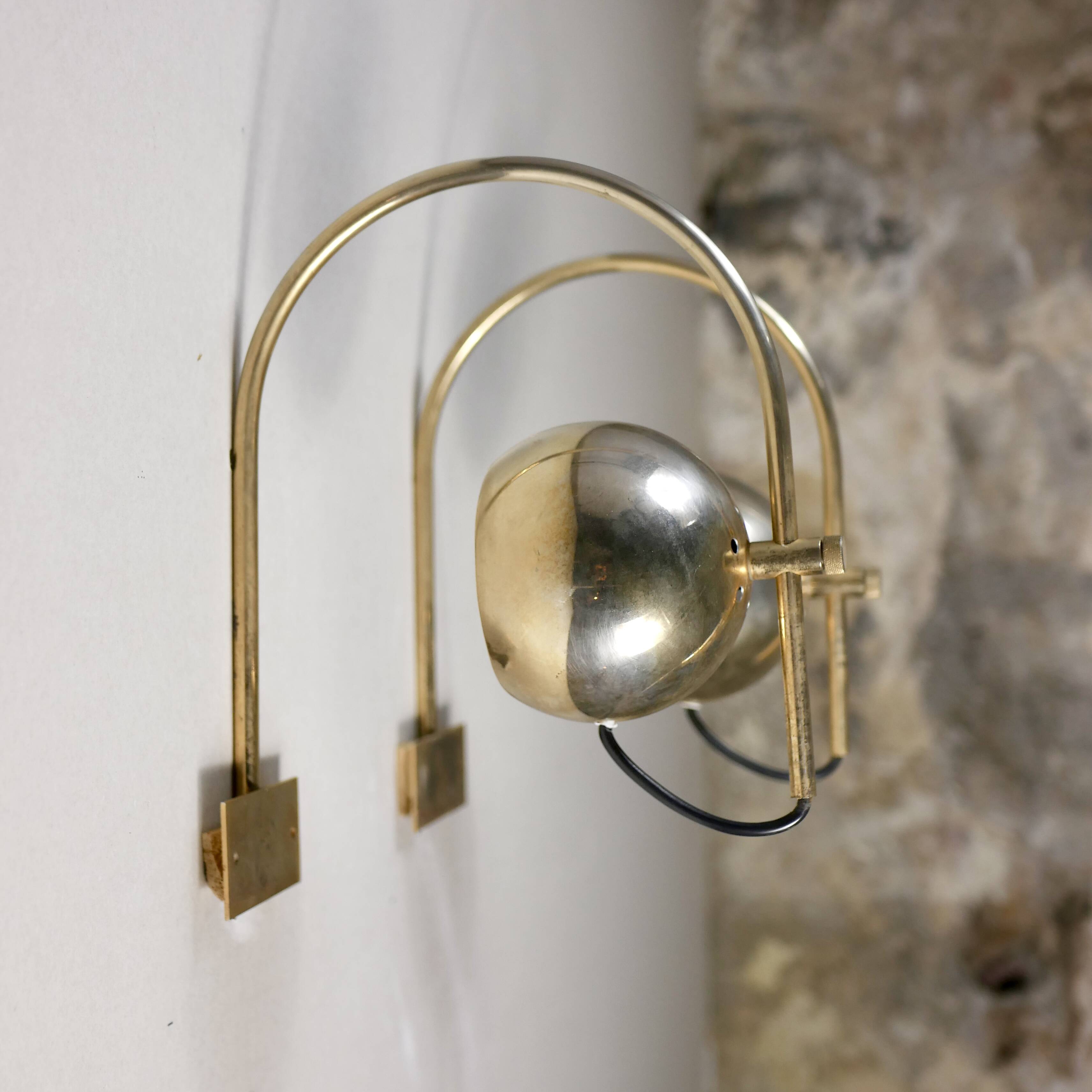 Pair of brass eyeball wall lights