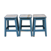 Three blue wooden stools