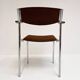 Set of 6 stackable chairs in rust colour by Gijs van der Sluis, 1970s.
