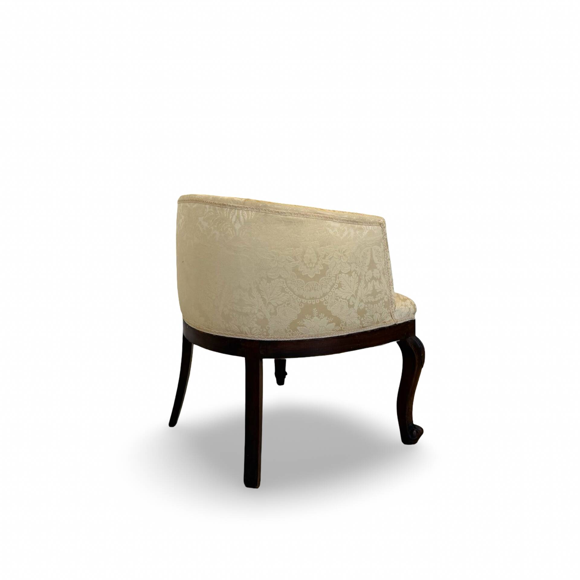 An antique Italian bar chair and a matching tufted vanity stool.