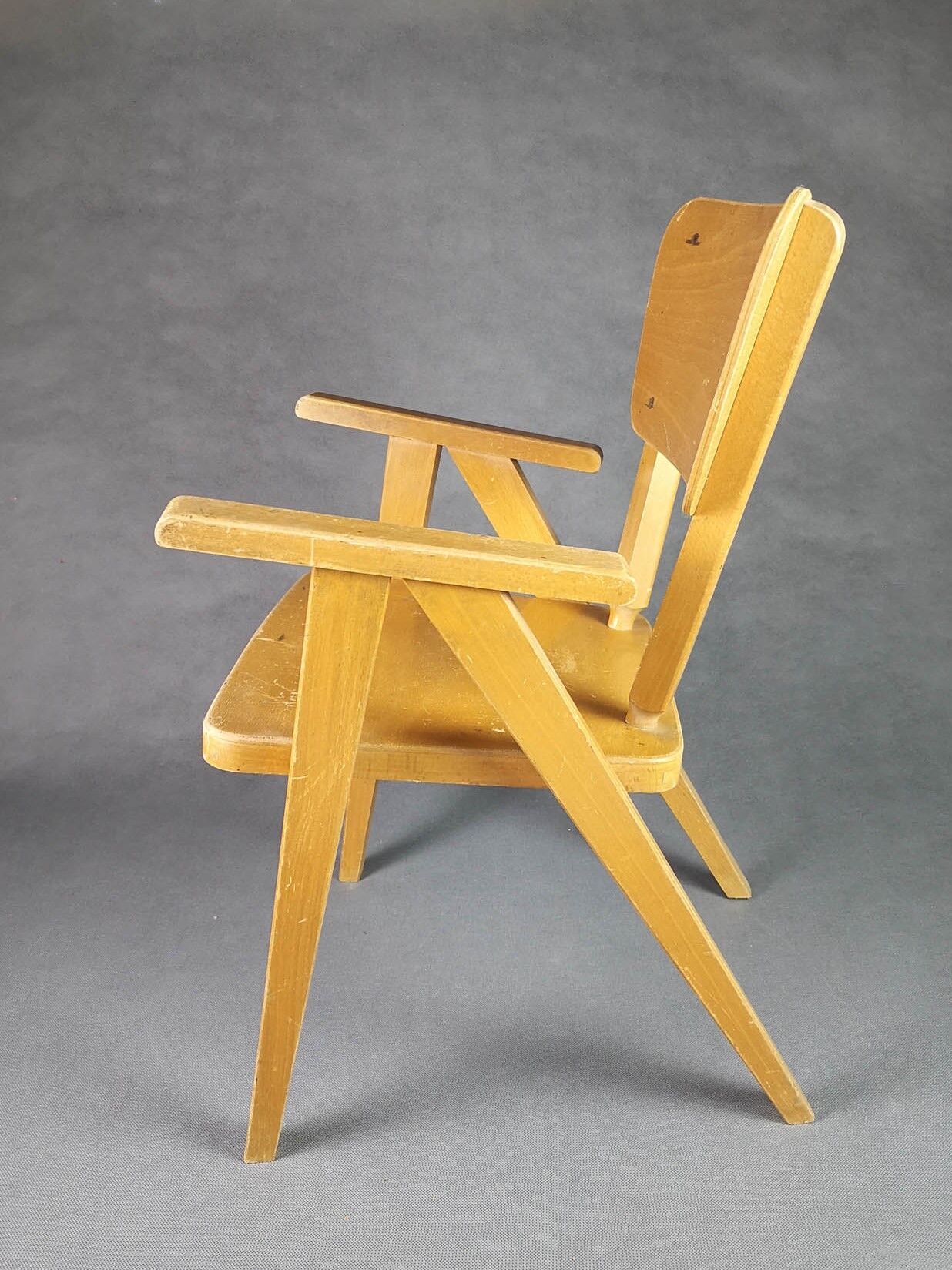 Vintage armchair child feet compass light wood