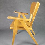 Vintage armchair child feet compass light wood