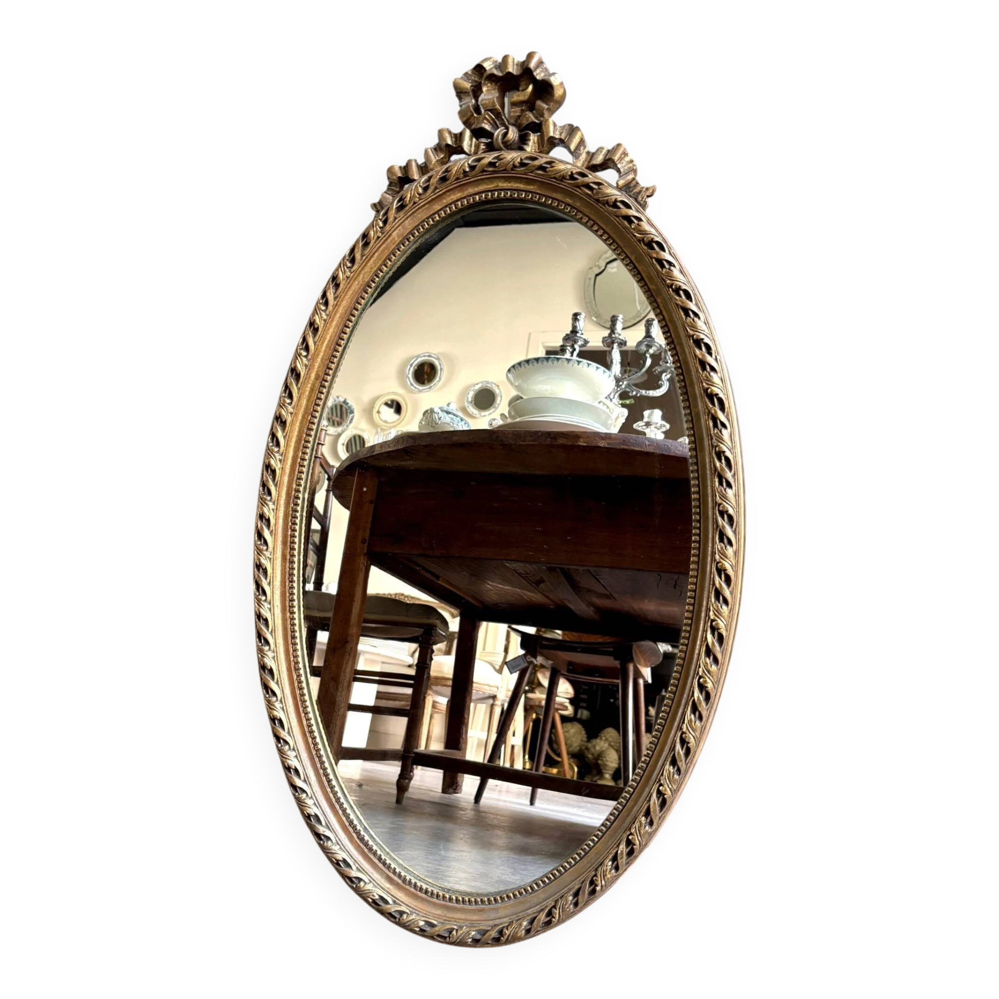 Miroir ovale classique doré à décor de noeud