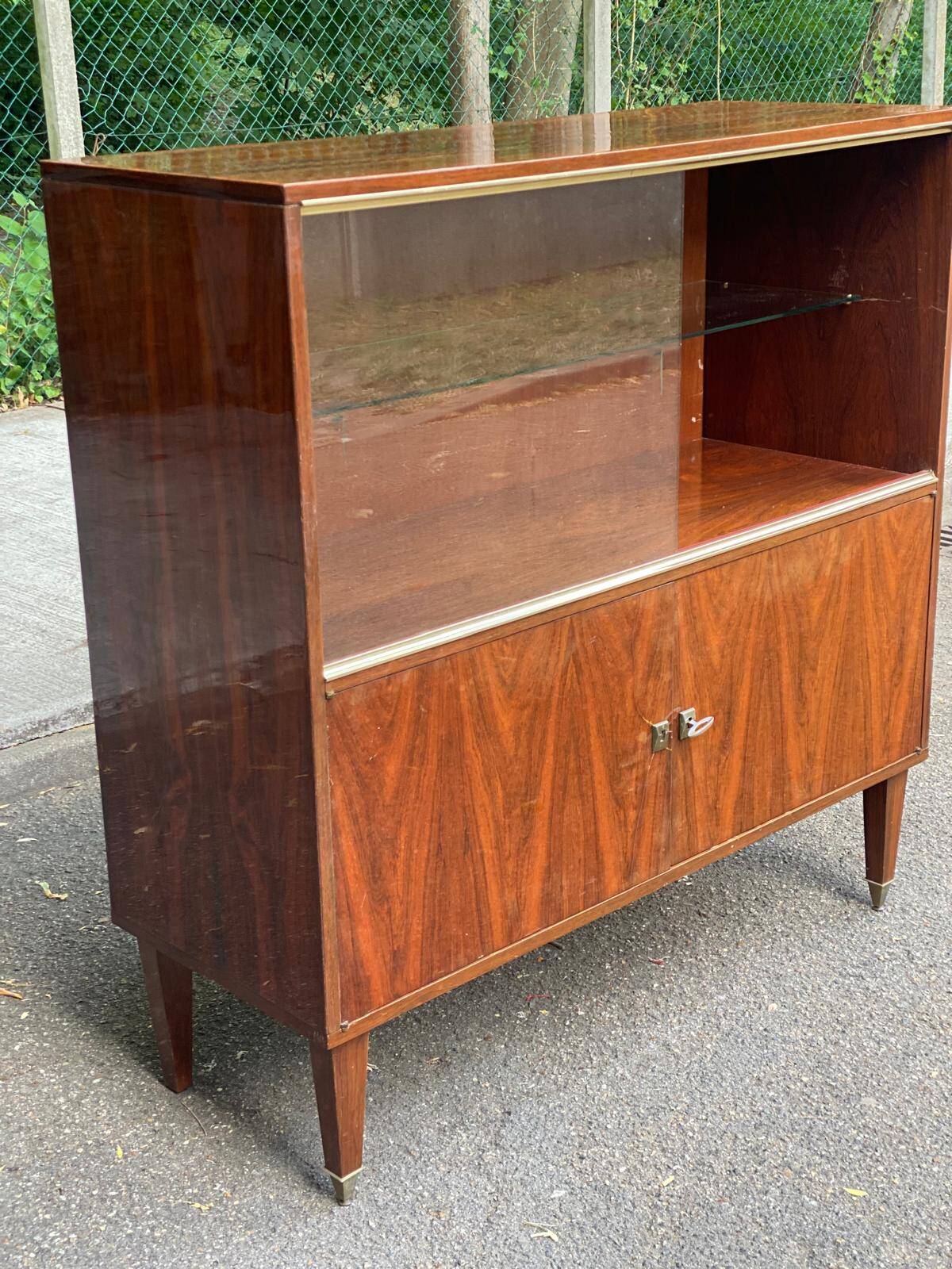 Scandinavian high buffet display cabinet in rosewood from the 1950s.