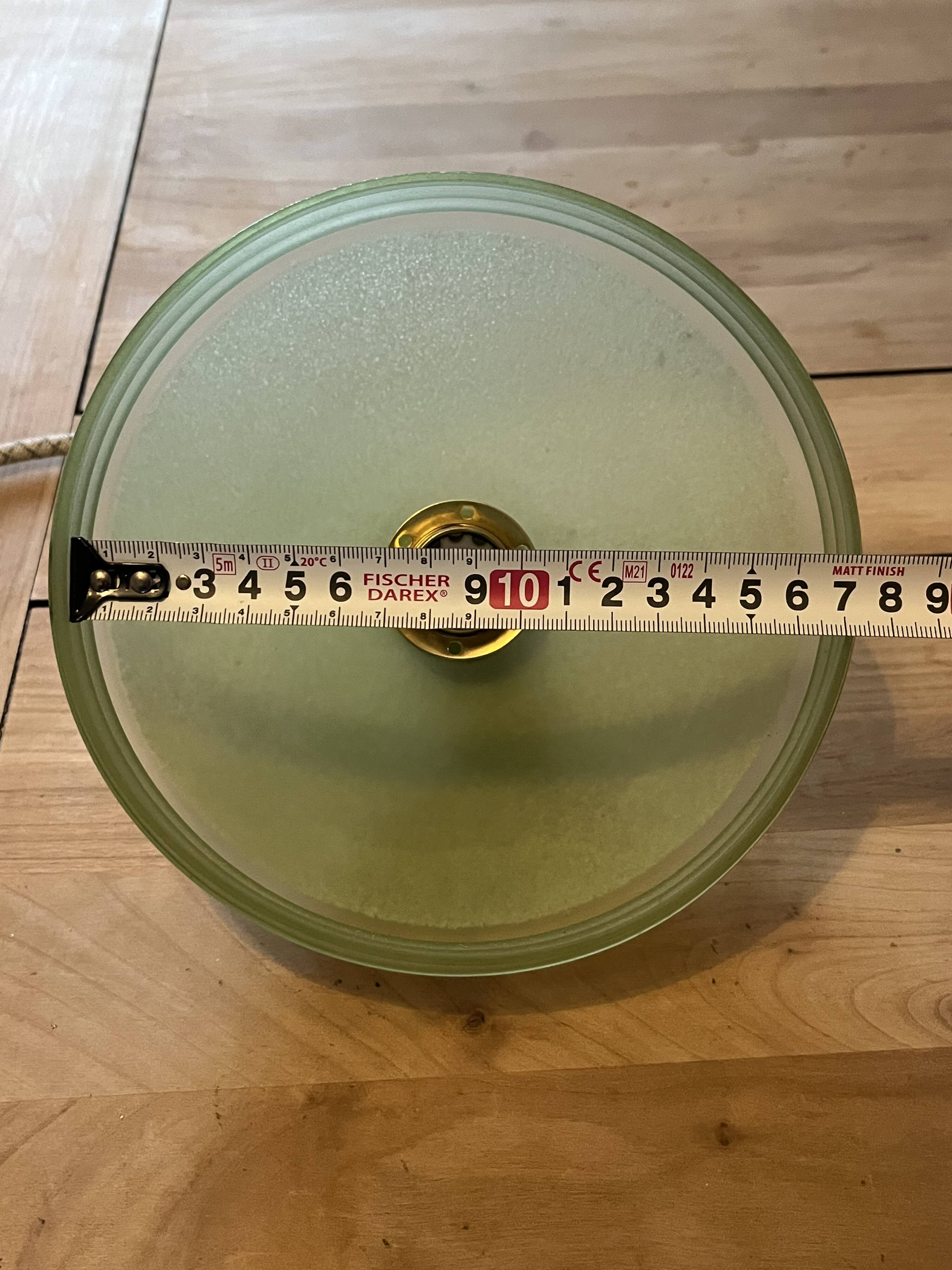 vintage Art Deco suspension in frosted almond green glass with golden trim