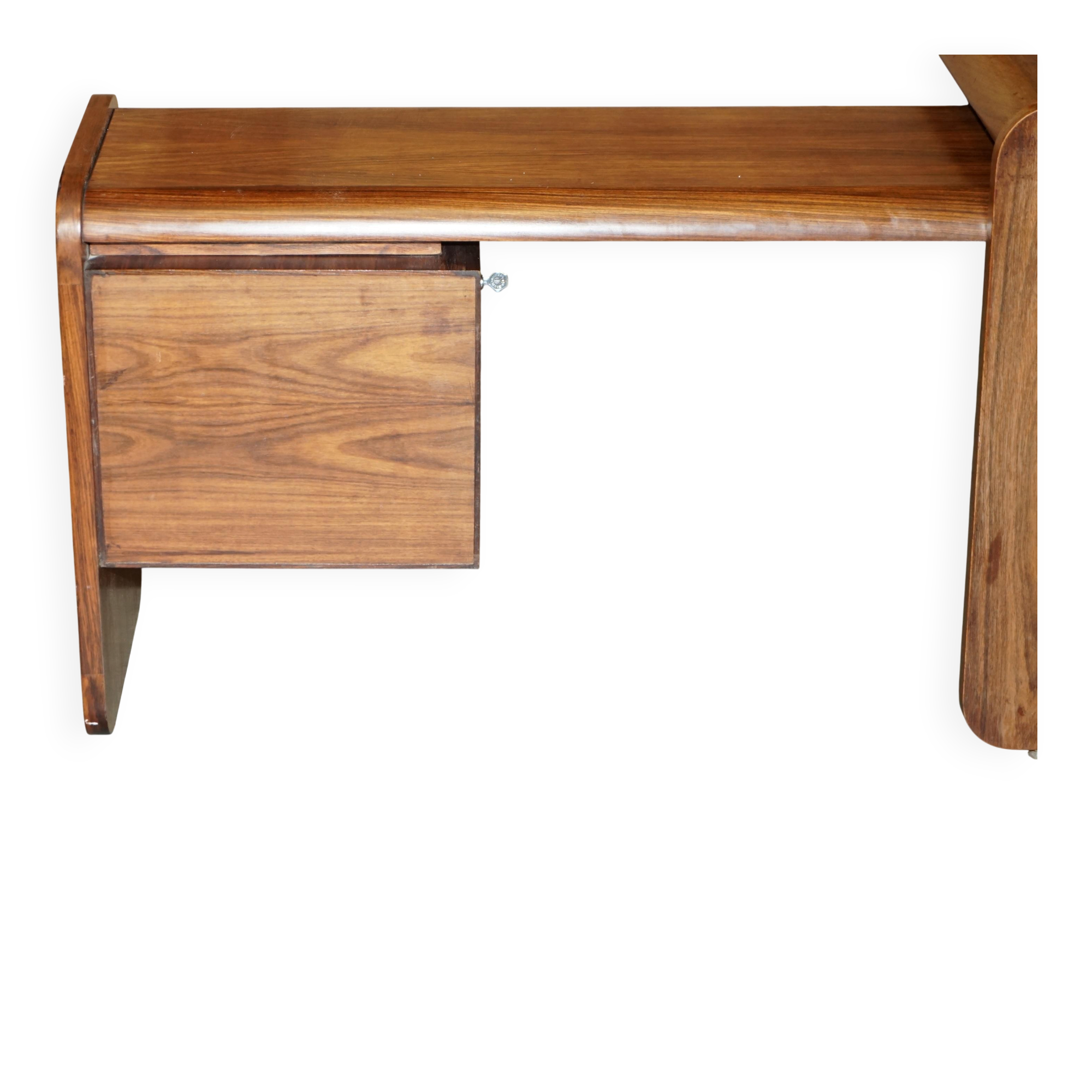 Mid-century modern right-angle desk in Brazilian wood.