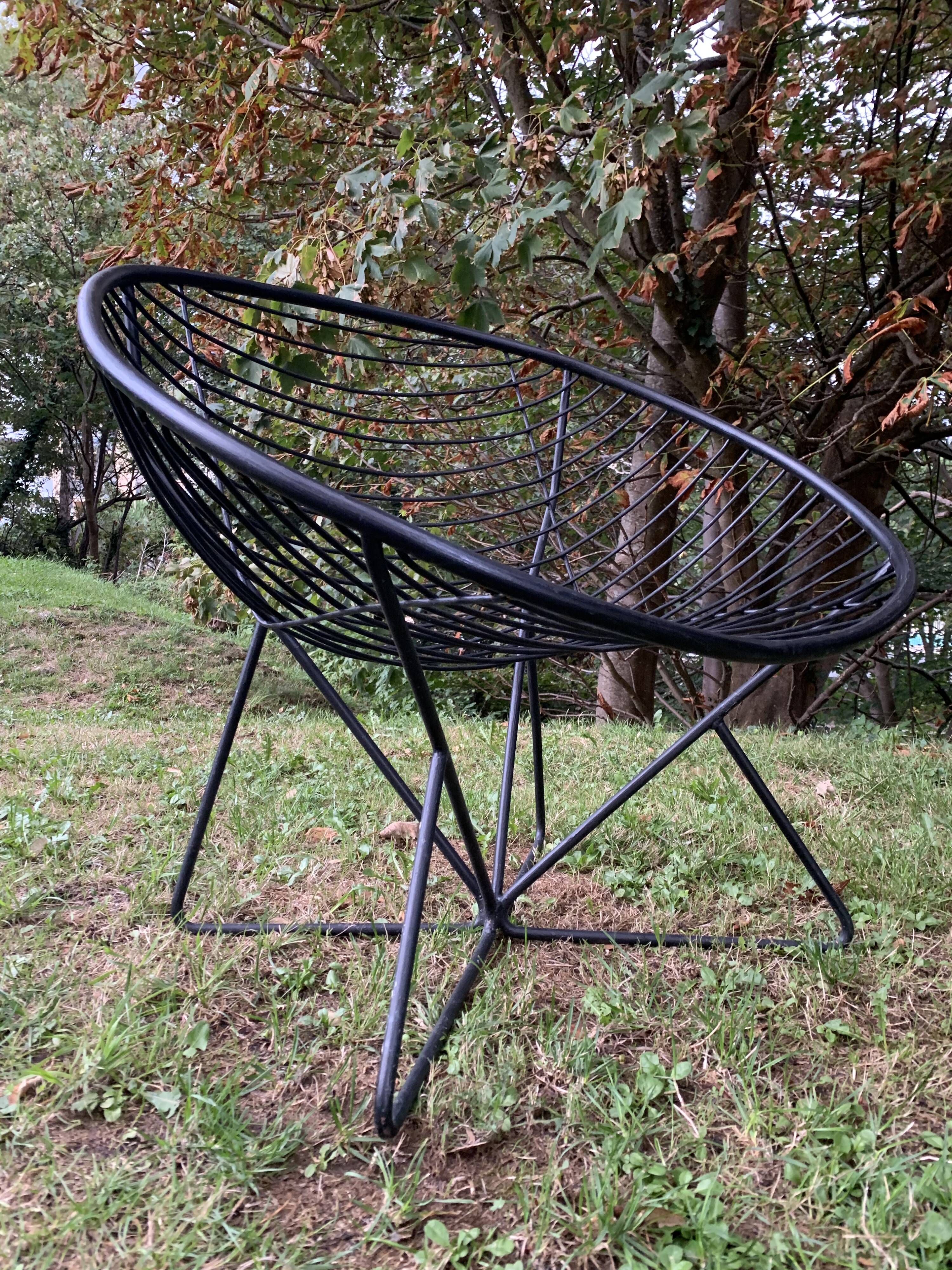 Pair of round chairs in black tubular steel 1960