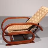 An exceptionally rare mahogany recliner crafted in Italy during the 1950s"