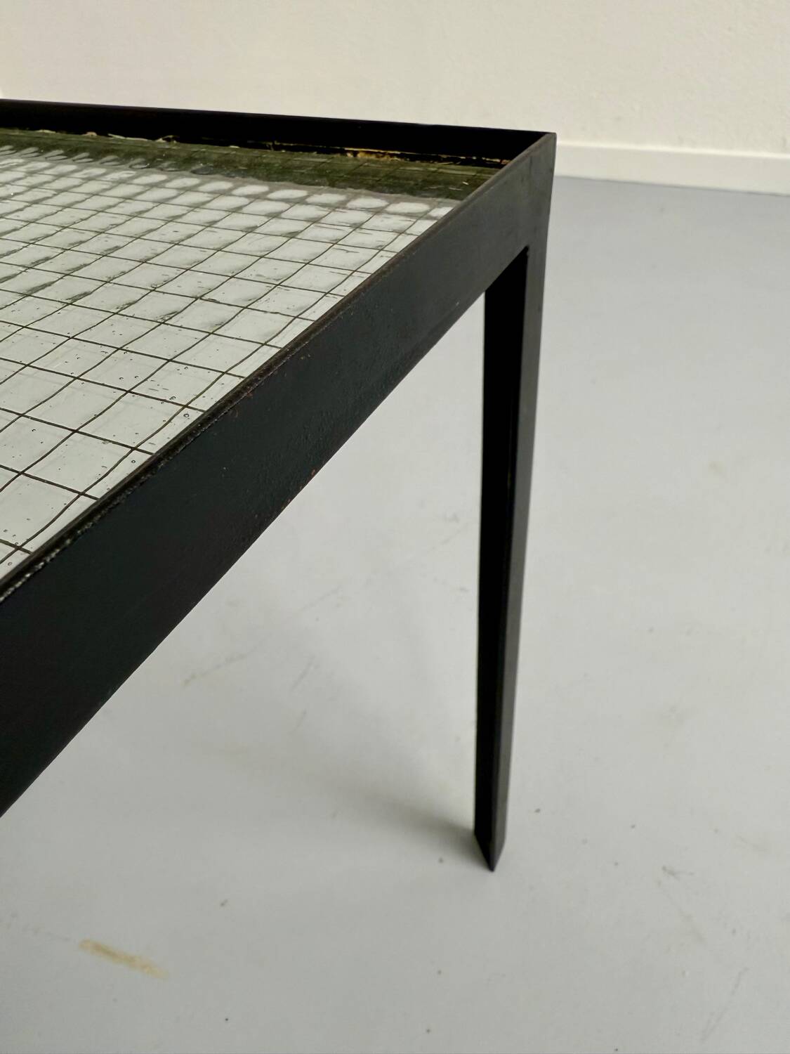 Old coffee table in metal and checkered glass from the 50s