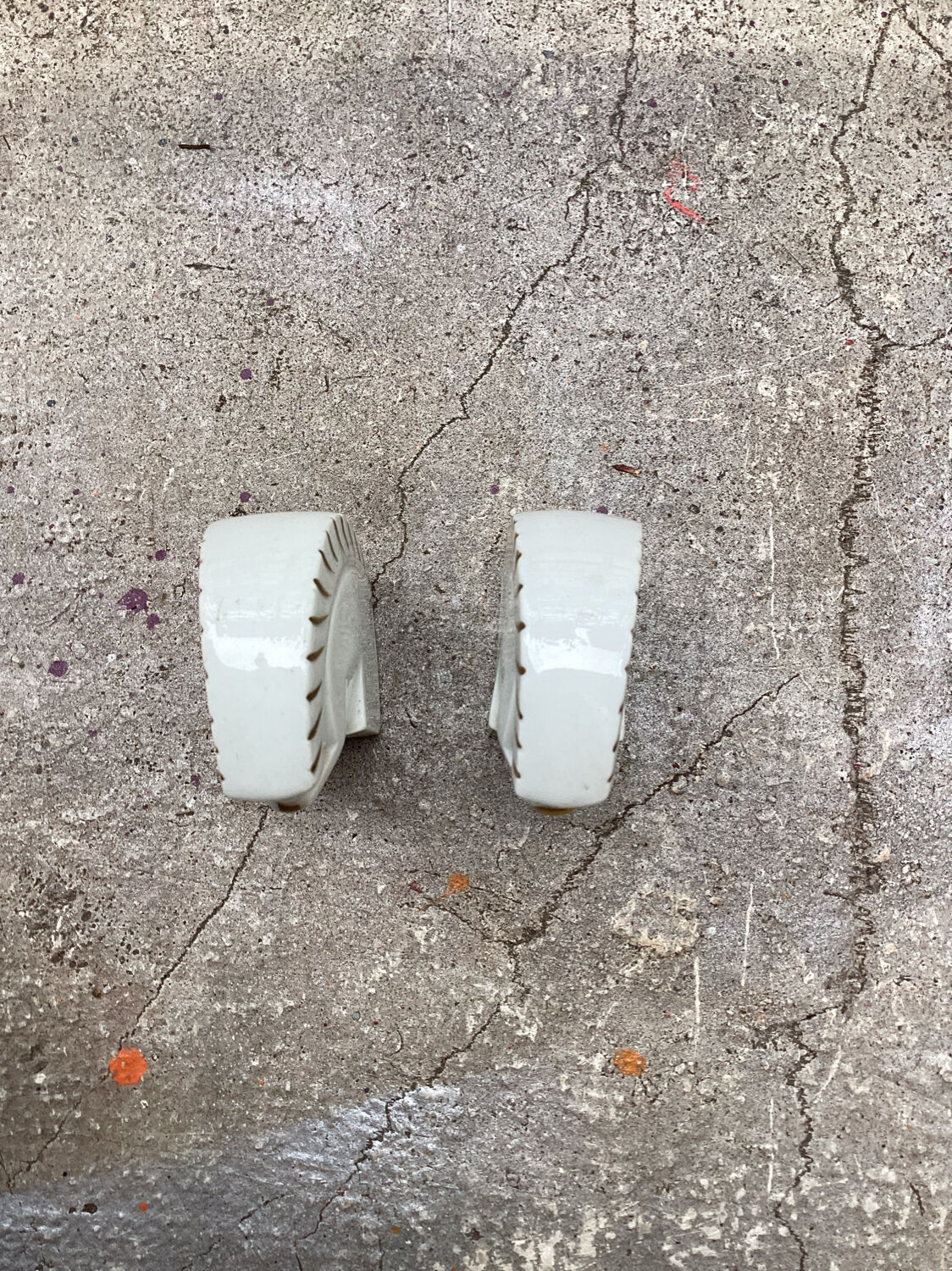 Pair of ceramic squirrels from Limoges signed Rys