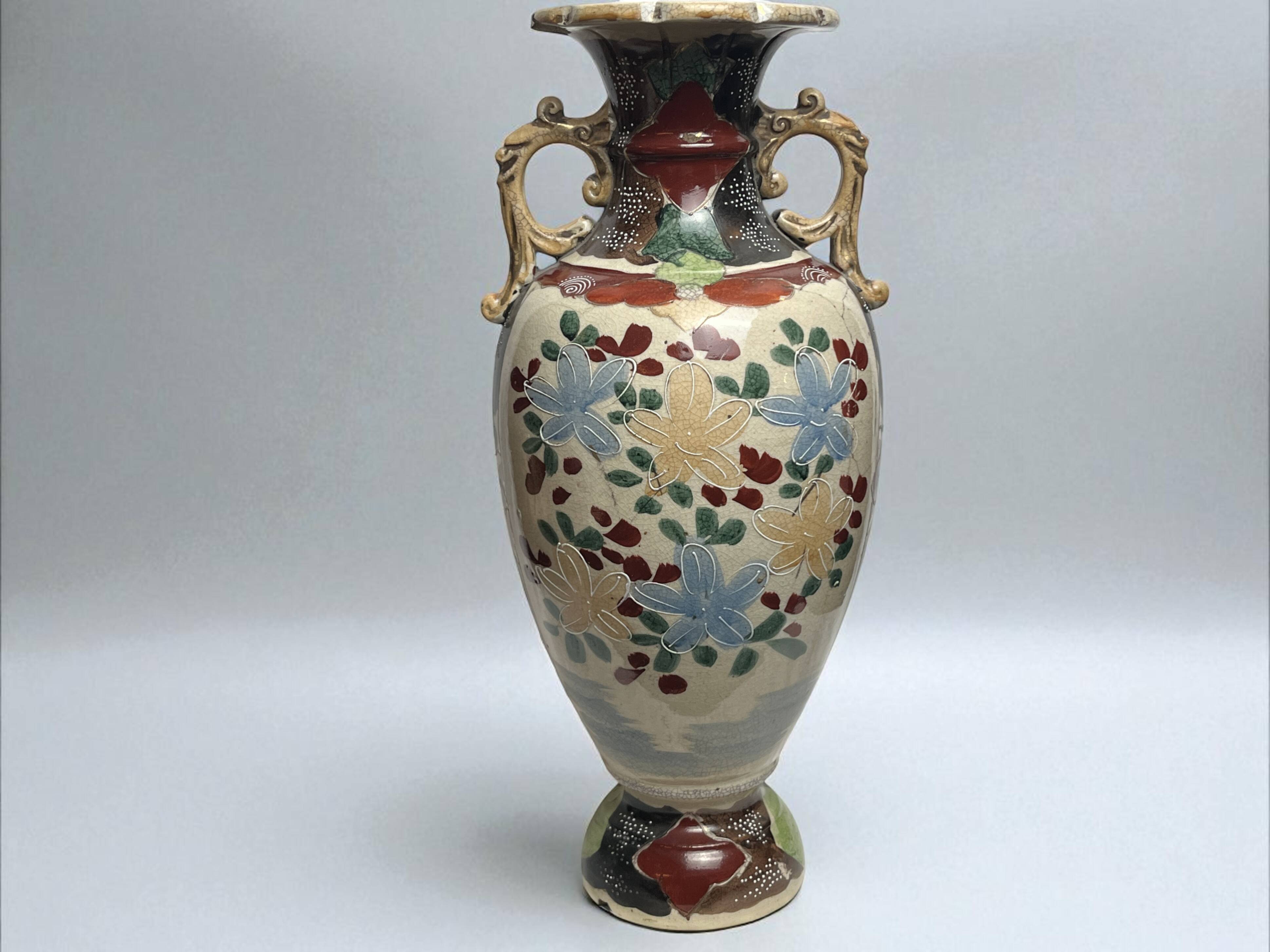 Japan, Satsuma vase with richly decorated handles, signed, early 20th century