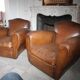Lot de 2 fauteuils club en cuir années 50